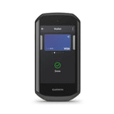 Garmin Edge 1050 GPS bike computer displaying navigation map and performance metrics on screen.