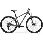 Merida Big Nine 20 aluminium mountain bike with Shimano CUES U2000 components and inboard disc brakes, ready for trail riding.