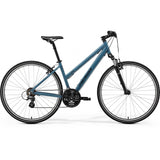 Merida Crossway 10-V women's hybrid bike with Shimano Acera gears and disc brakes, featuring a sleek frame and comfortable design.