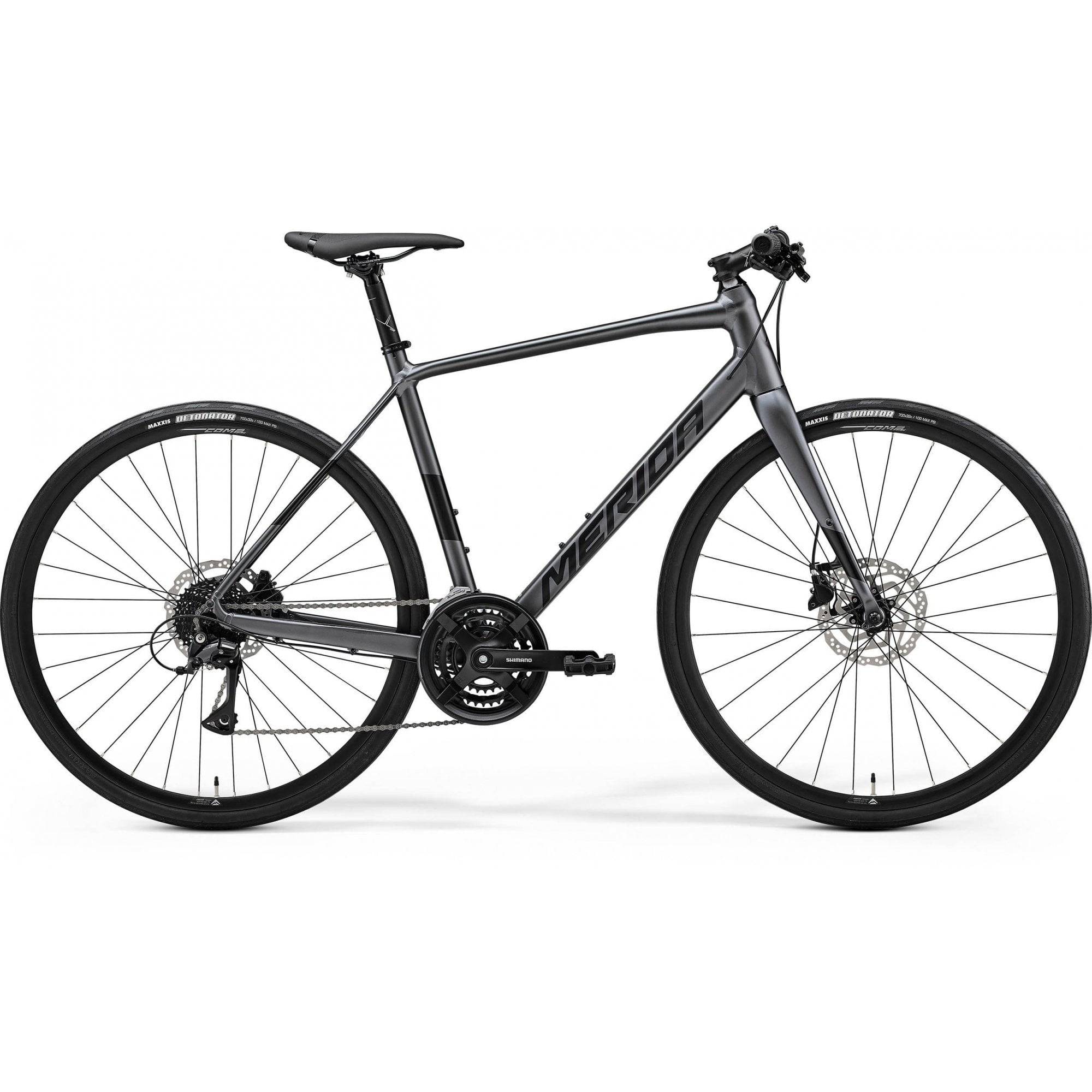 Merida Speeder 100 hybrid bike with Shimano Acera components and hydraulic disc brakes, black and silver frame.