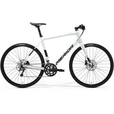 Merida Speeder 300 hybrid bike with hydraulic disc brakes and carbon fork, ideal for commuting and fitness riding.