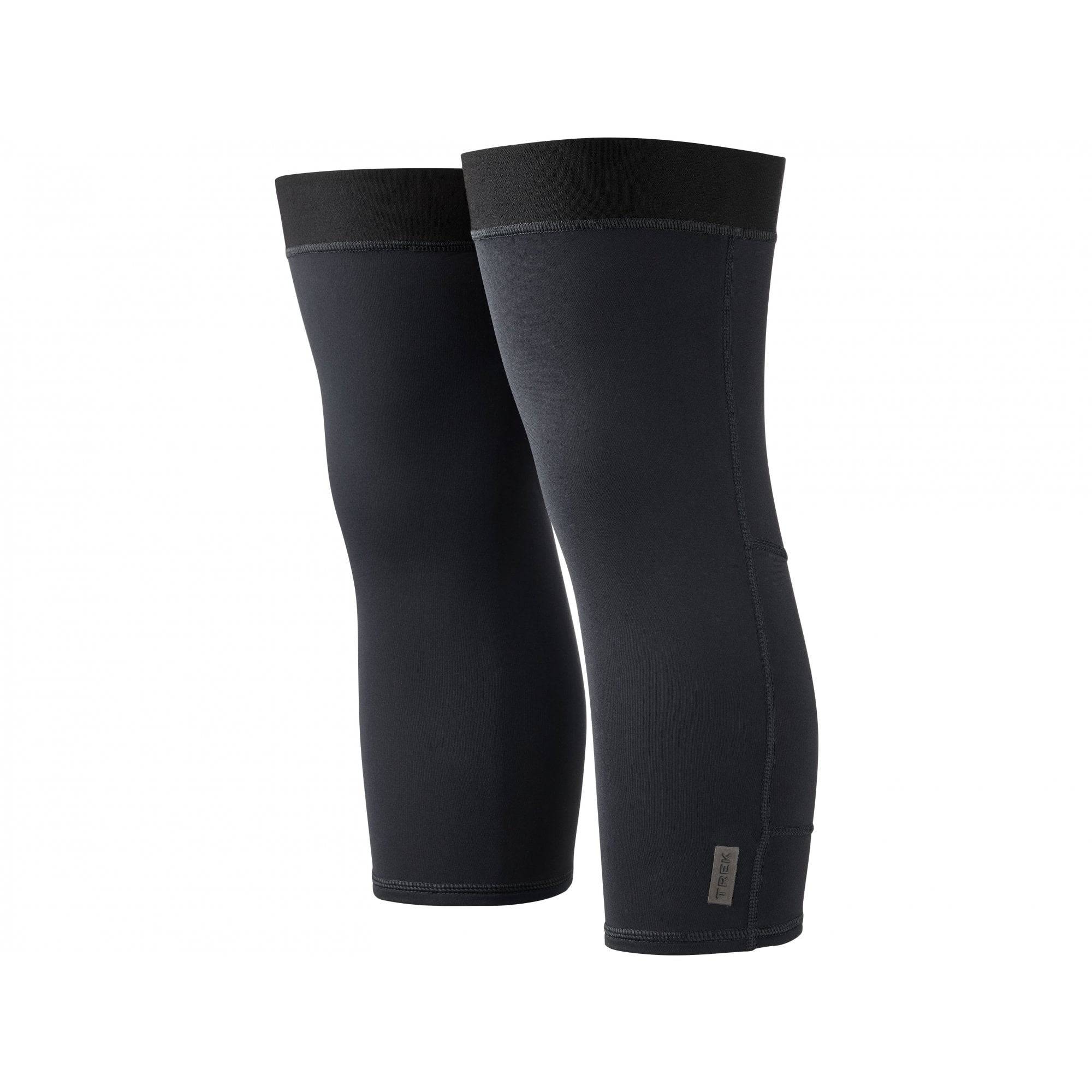 Trek thermal cycling knee warmers in black, insulated and ergonomic, designed for cold weather outdoor riding.