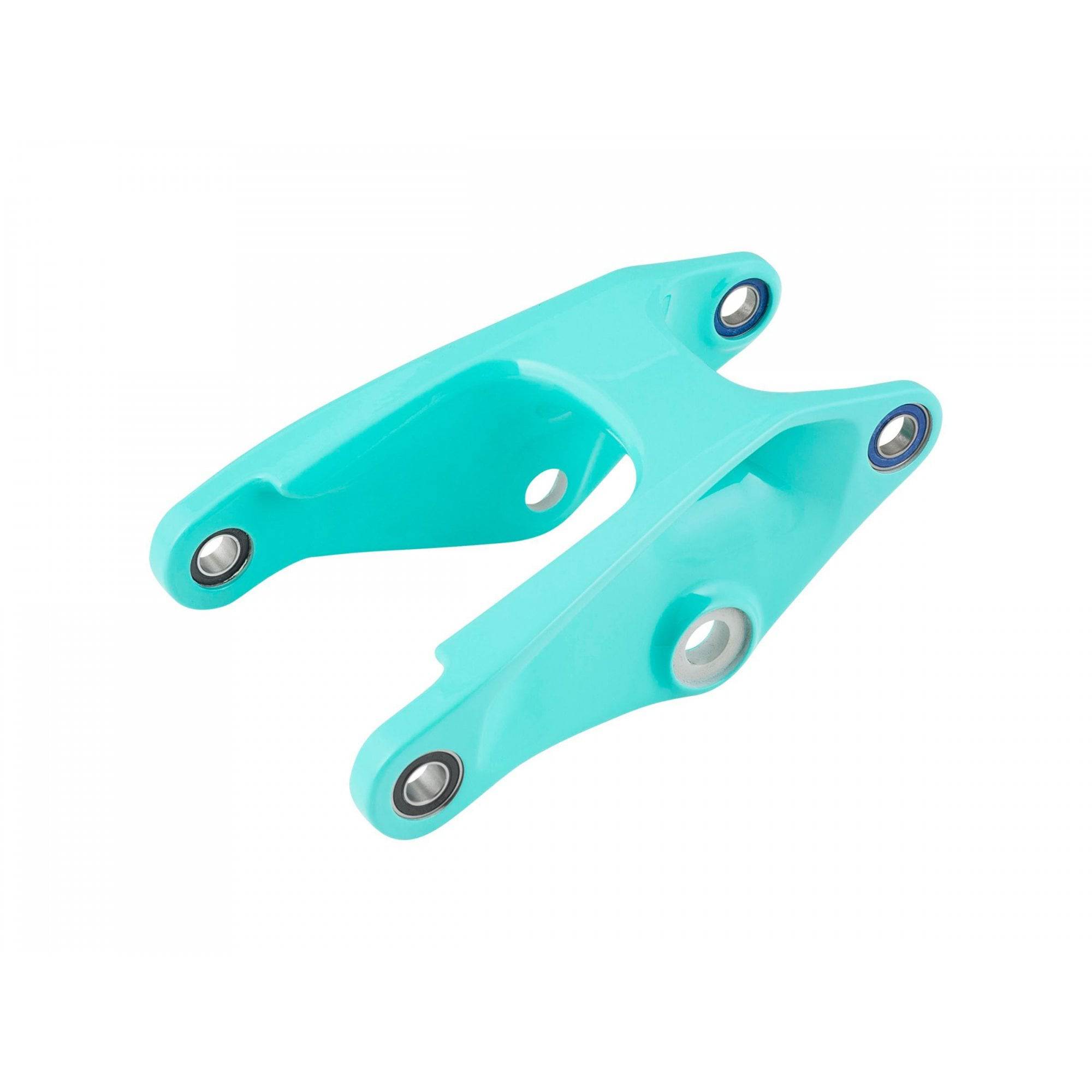 Trek aluminum rocker links for 2021 Slash 29 mountain bike suspension, close-up of spare MTB frame components.