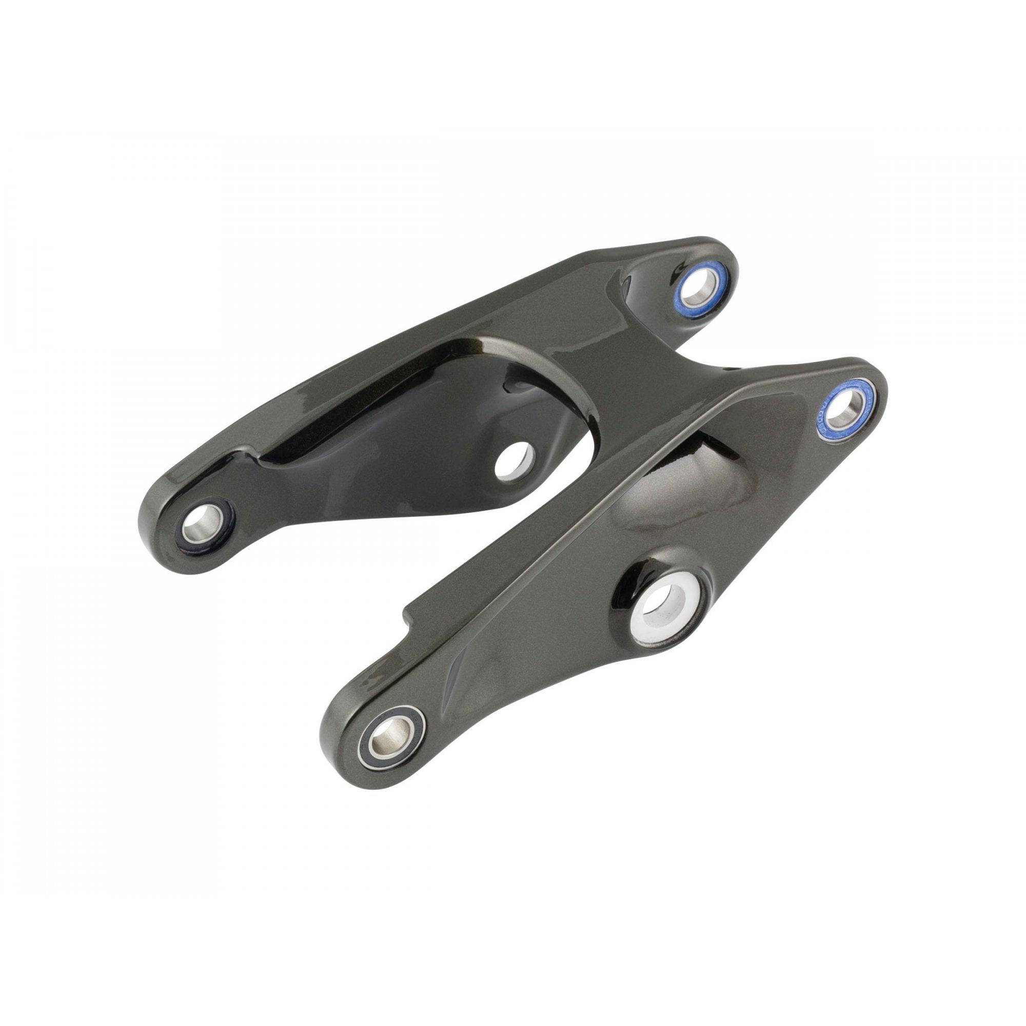 Trek aluminum rocker links for 2021 Slash 29 mountain bike suspension, close-up view of MTB frame spare components