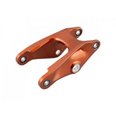 Trek aluminum rocker links for 2021 Slash 29 MTB suspension, close-up of spare frame component on a white background.