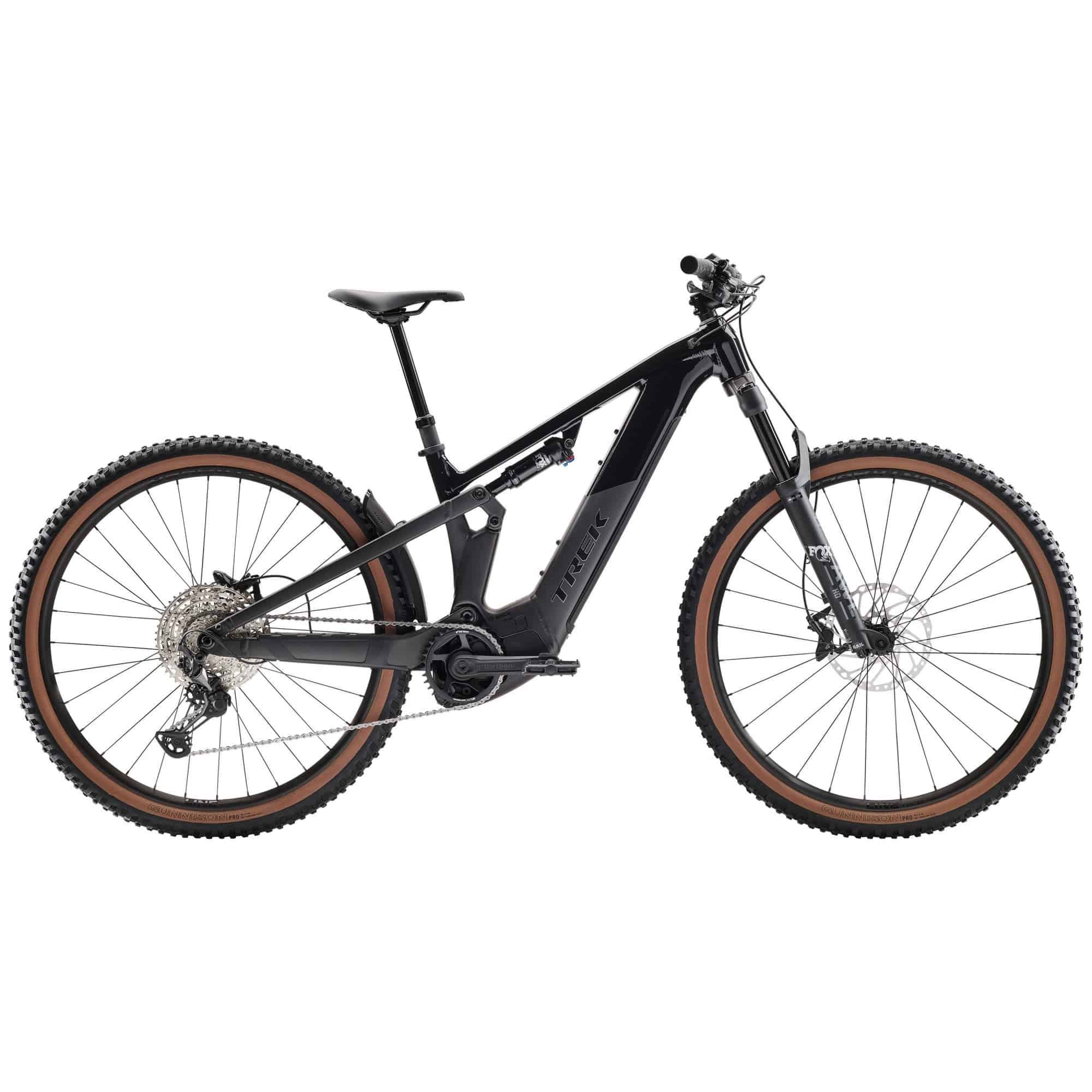 Trek Powerfly FS+ 6 2025 electric mountain bike with Shimano Deore XT gears and Gen 4 electric system, rugged mountain trail ready.