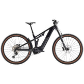 Trek Powerfly FS+ 6 2025 electric mountain bike with Shimano Deore XT gears and Gen 4 electric system, rugged mountain trail ready.