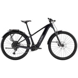 Trek Powerfly+ 4 EQ electric mountain bike with 29-inch wheels and Gen 5 motor, black frame and mountain bike components.