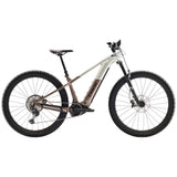 Trek Powerfly+ 8 electric mountain bike with Gen 5 motor and Shimano Deore XT drivetrain, shown on rugged trail.