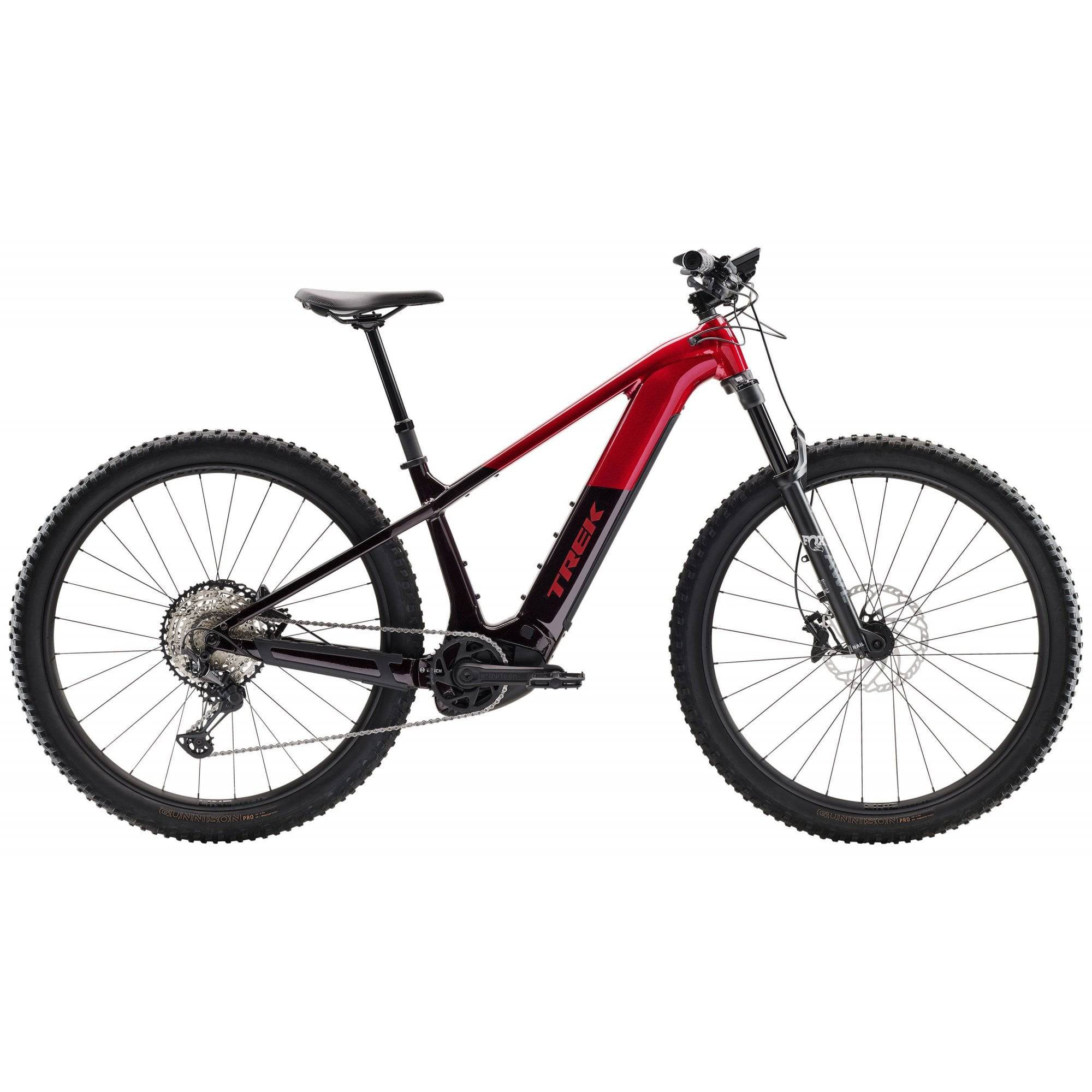 Trek Powerfly+ 8 electric mountain bike with Gen 5 motor and Shimano Deore XT drivetrain, showing the bike's frame and mountain tires.