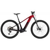 Trek Powerfly+ 8 electric mountain bike with Gen 5 motor and Shimano Deore XT drivetrain, showing the bike's frame and mountain tires.