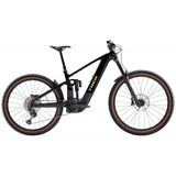 Trek Rail+ 8 electric mountain bike with Gen 5 motor and Shimano Deore XT groupset, showing the sturdy frame and mountain bike tires.