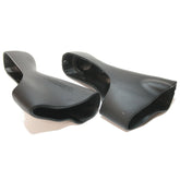 Pair of Shimano Ultegra ST-6800 black brake lever bracket covers, genuine replacement components for road bike shifters.