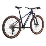 Giant Talon 29 0 mountain bike with Shimano Deore M6100 drivetrain and disc brakes, ready for off-road cycling adventures.