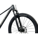 Giant Talon 29 1 mountain bike with Shimano CUES U6000 disc brakes, unisex MTB bike with a sturdy frame and knobby tires.