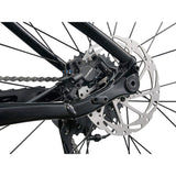 Giant Talon 29 3 mountain bike with Shimano Acera 1x drivetrain and front suspension on rugged trail.