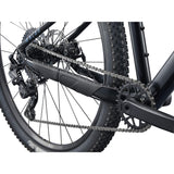 Giant Talon 29 4 mountain bike featuring microSHIFT 1x drivetrain and front suspension fork on rugged trail.