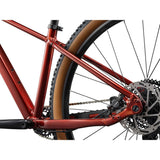 Liv Tempt 2 mountain bike with ALUXX aluminum frame, 27.5/29-inch wheels, and 1x drivetrain, shown on trail.