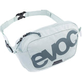 EVOC Hip Pack Kids 1L, compact cycling pannier bag for young cyclists, black with adjustable strap and EVOC logo.