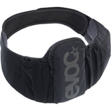 EVOC Trail Belt 08L adjustable outdoor pannier bag with multiple compartments for essentials, shown in a natural outdoor setting.