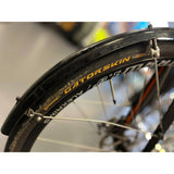 Genesis CDA 20 men's road bike with 700c wheels, lightweight frame, and performance design for road cycling.