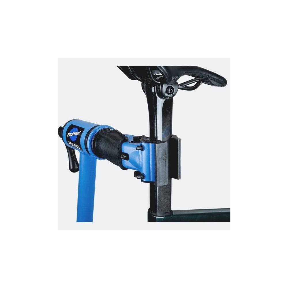 Park Tool 1971 clamp adapter for D-profile seatposts, used as a workshop repair stand accessory for secure bike maintenance.