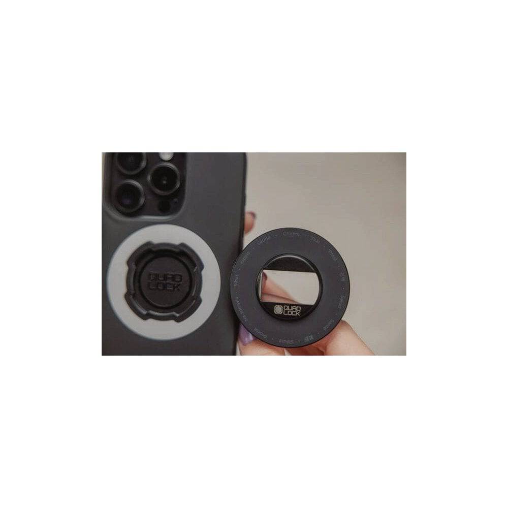 Quad Lock MAG Phone Ring Stand accessory with magnetic grip and bottle opener for secure phone handling and convenience.