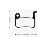 Aztec e-Bike disc brake pads for Shimano XTR M975, M965, M966, and Saint M800 mountain bike components, shown mounted on brake caliper.