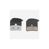 Shimano H03C-MF metal sintered disc brake pads with spring and cooling fins for 4-piston bicycle brake calipers.