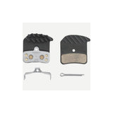 Shimano H03C-MF metal sintered disc brake pads with spring and cooling fins for 4-piston mountain bike brake calipers.