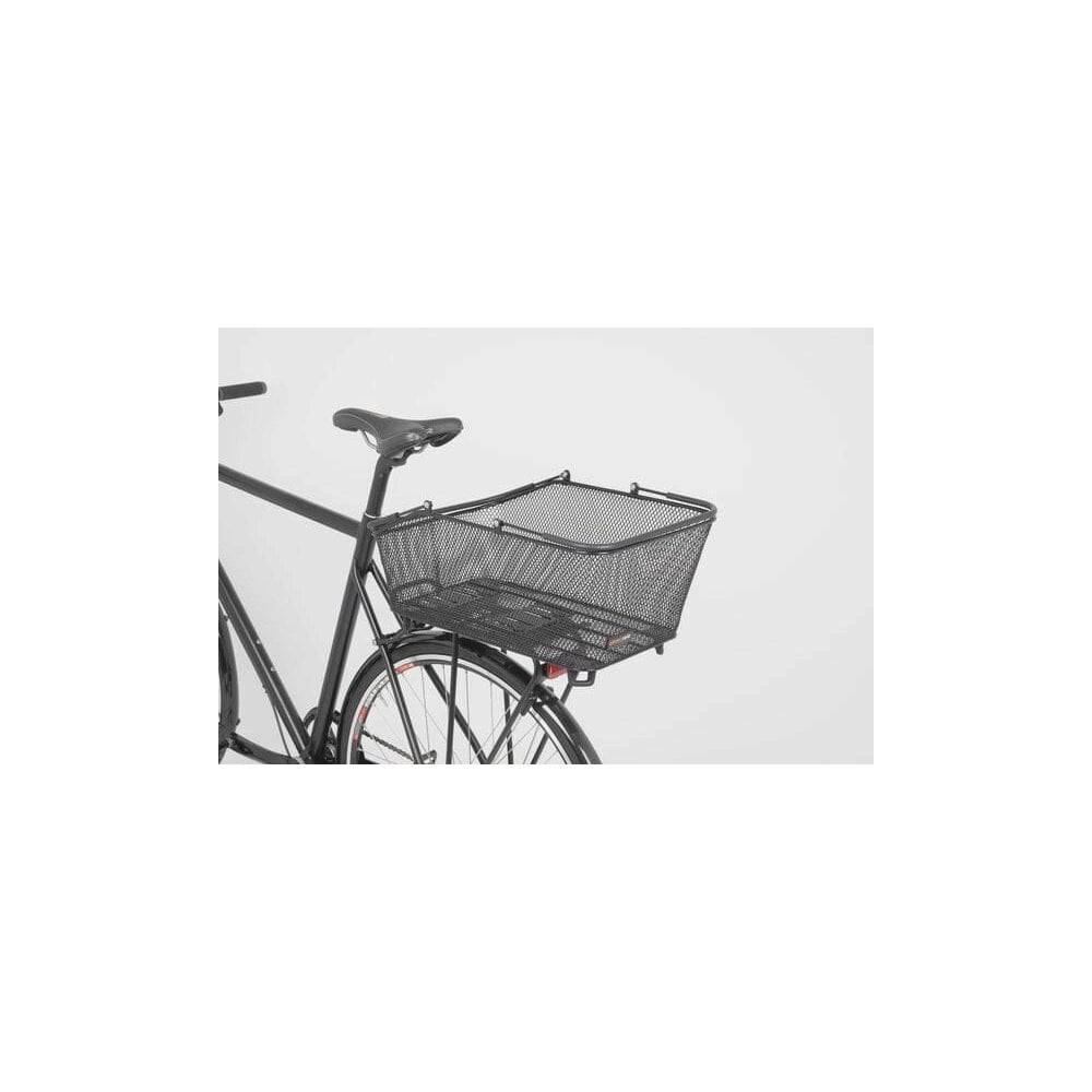 AtranVelo DAILY AVS 28L bike basket attached to a bike pannier rack, showing easy attachment system for cycling accessories.