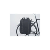 AtranVelo METRO AVS side bag with laptop compartment mounted on triple-X pannier rack, showing durable bike accessories for commuting.