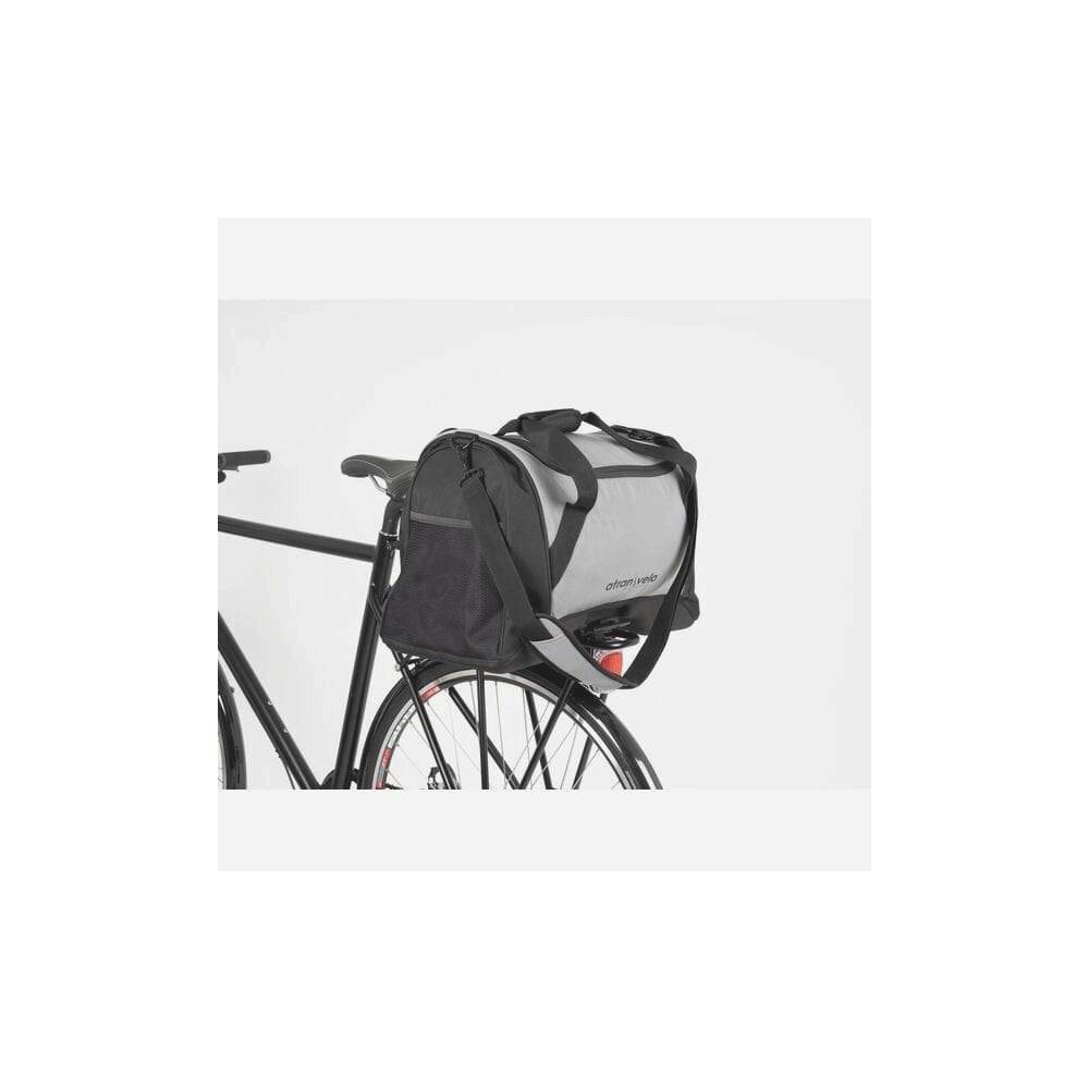 AtranVelo PULSE AVS 36L black reflective duffle bag with AVS mounting system, showing its rugged, spacious design and reflective features.