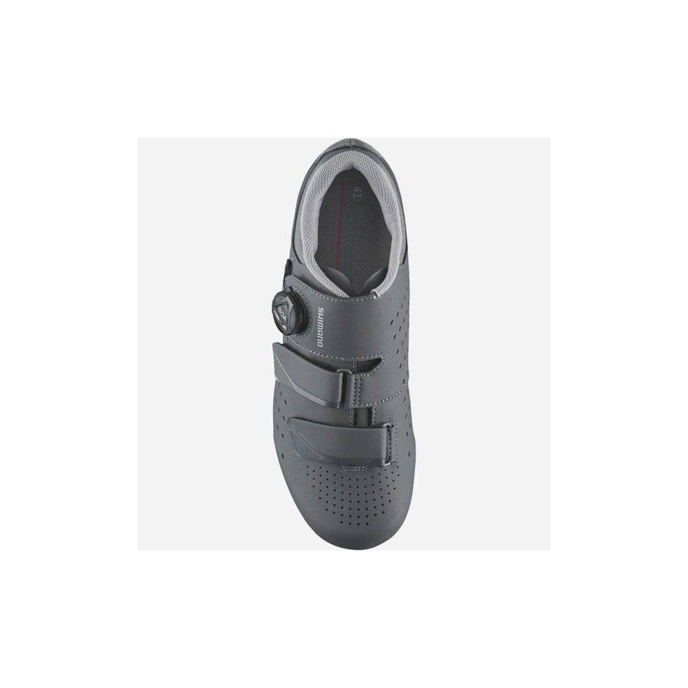 Shimano RX6 gravel cycling shoes with BOA L6 dial and carbon sole, shown with black and grey design and secure fit features.