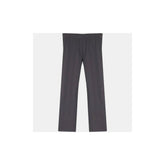 Unisex waterproof reflective overtrousers by HUMP, adjustable fit, shown with waterproof fabric and reflective strips for visibility.