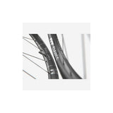 DT Swiss XMC 1200 29-inch front mountain bike wheel with 30mm carbon rim and BOOST axle, showcasing sleek bike component design.