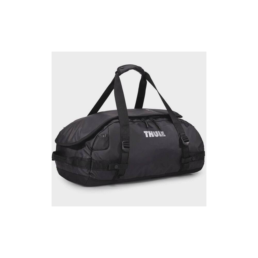 Thule Chasm duffel bag with convertible backpack straps and durable wheels, showing its rugged design and sturdy handles.