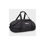 Thule Chasm duffel bag with convertible backpack straps and durable wheels, showing its rugged design and sturdy handles.
