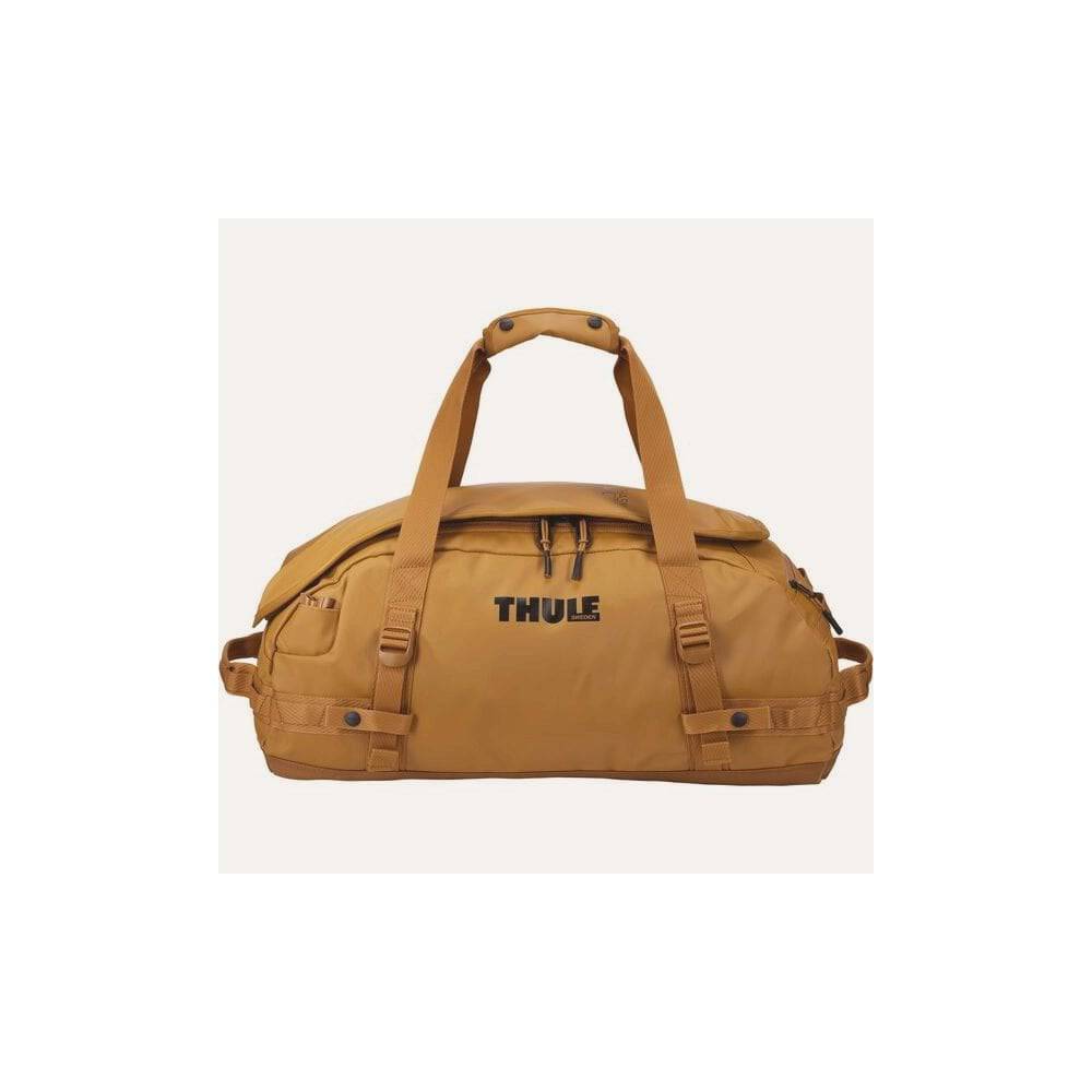 Thule Chasm Duffel Bag with convertible backpack straps and durable wheels, showcasing its rugged design and spacious storage.