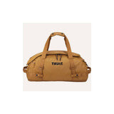 Thule Chasm Duffel Bag with convertible backpack straps and durable wheels, showcasing its rugged design and spacious storage.
