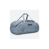 Thule Chasm Duffel Bag with convertible straps and durable wheels, showcasing its rugged design and spacious interior.