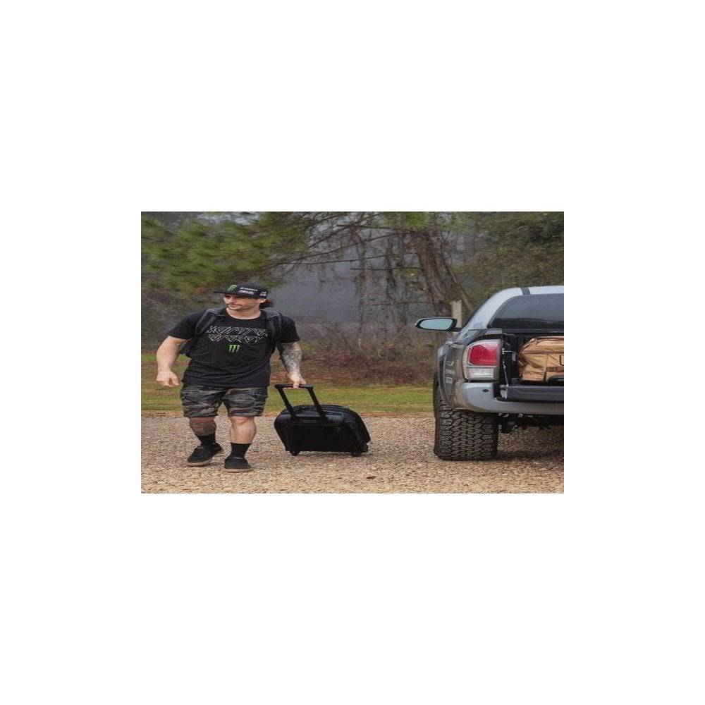 OGIO ONU-22 pannier bag with weather-resistant fabric, skate wheels, and expandable design for versatile accessories storage.