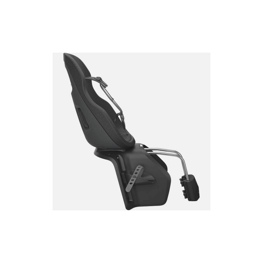 Thule Yepp Nexxt 2 Maxi child bike seat frame mount with suspension and safety buckle, outdoor setup for children.