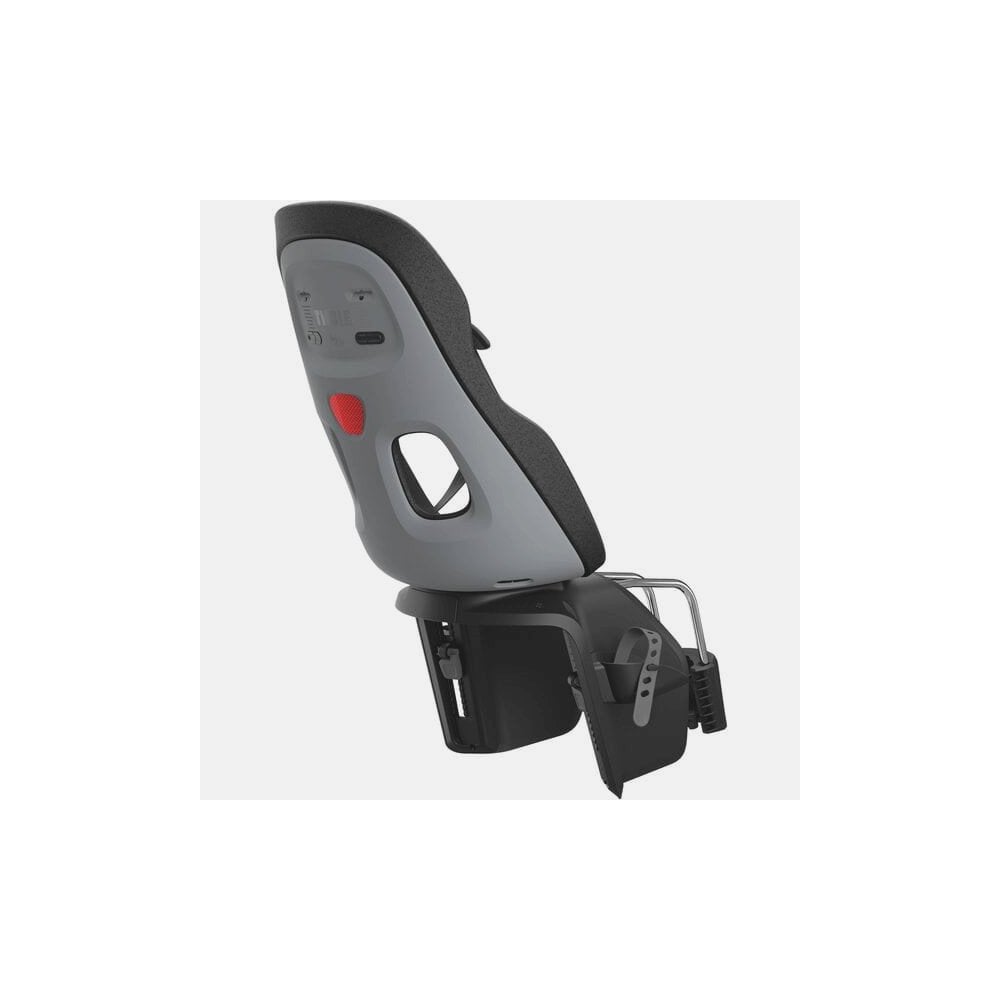 Thule Yepp Nexxt 2 Maxi frame mount child seat with suspension and safety buckle, designed for bike accessories.