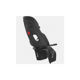 Thule Yepp Nexxt 2 Maxi child bike seat mounted on a rack, showcasing a safe and comfortable design for kids.