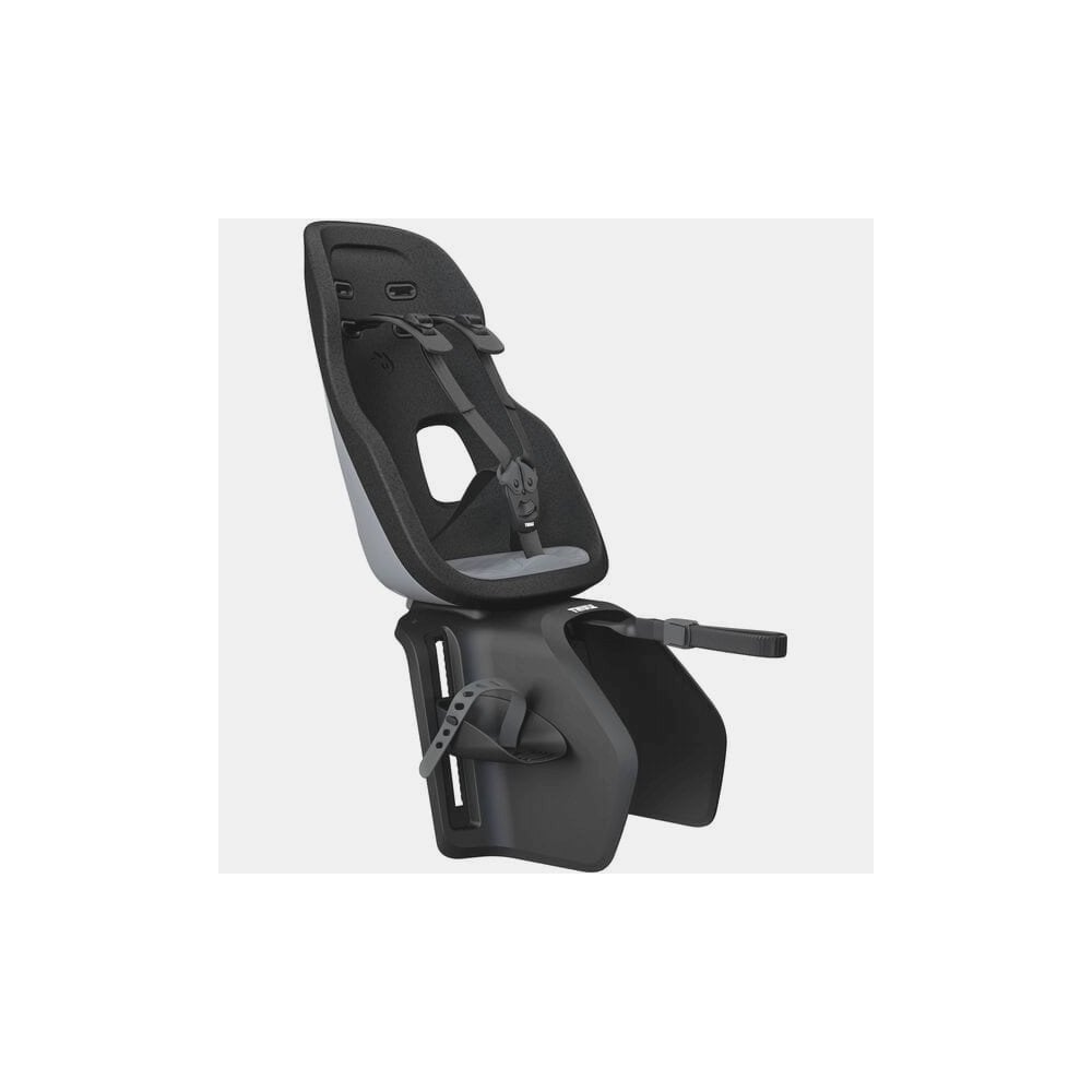 Thule Yepp Nexxt 2 Maxi rack mount child bike seat with safety harness for kids, shown installed on a bike.