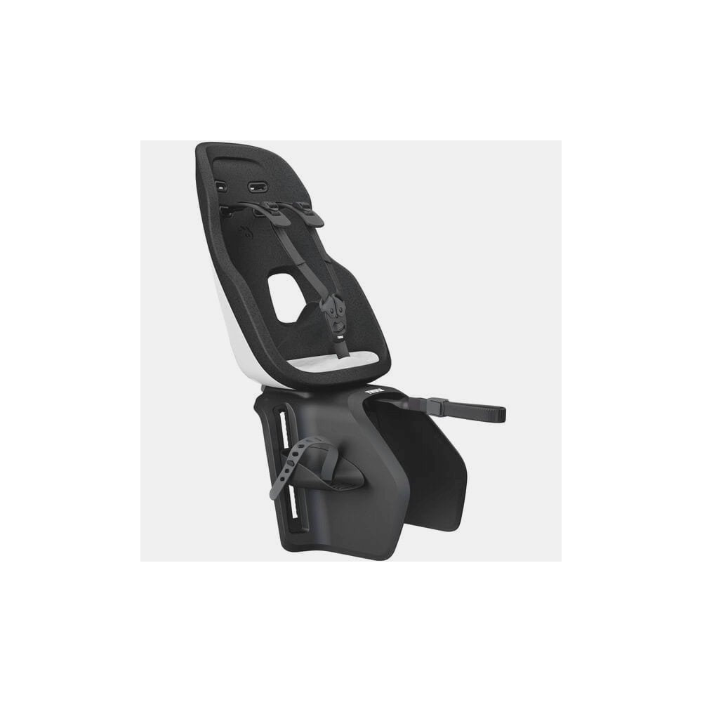 Thule Yepp Nexxt 2 Maxi rack mount child bike seat with safety harness and padding for kids, viewed from the side.