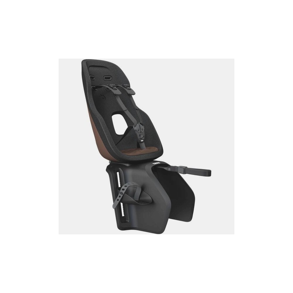 Thule Yepp Nexxt 2 Maxi rack mount child bike seat with safety harness for kids, shown mounted on a bike rack.