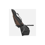 Thule Yepp Nexxt 2 Maxi rack mount child bike seat for kids, shown installed on a bike, highlighting safety and comfort features.