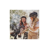 Urban Iki TA-KE front child bike seat in weather-resistant design, securely attached to a bicycle for safe child riding.